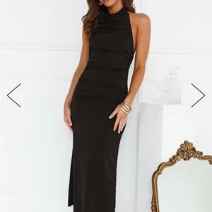 XS high neck halter style black dress. Belt not included. Sophisticated and sexy